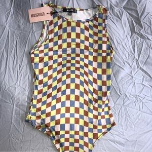 Missguided bodysuit. Runs small never worn.